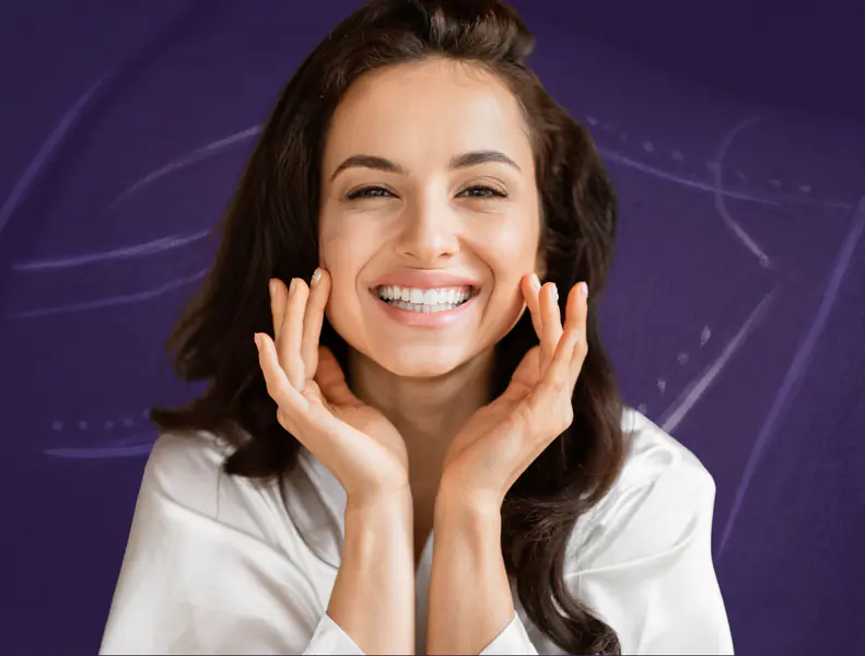 Model with natural makeup and sleek hairstyle.