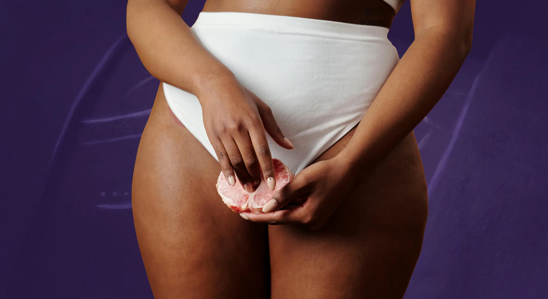 Model with natural makeup and sleek hairstyle.